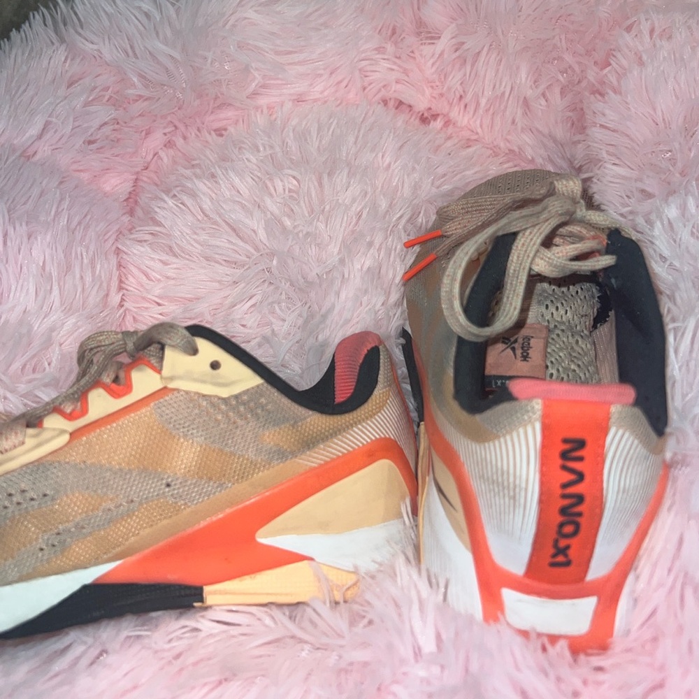 Multi orange colored Reebok sneakers
